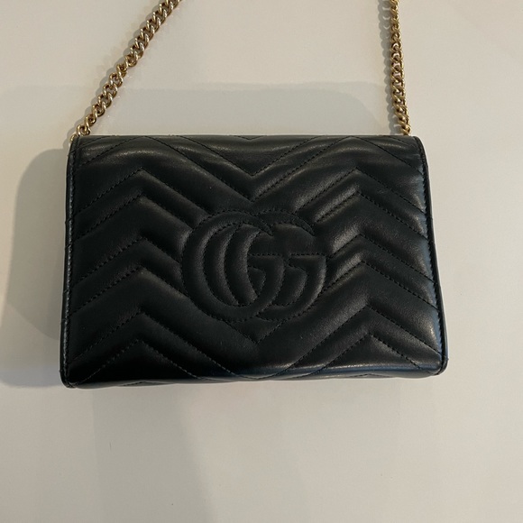 Black Gucci GG Marmont chain mini flap bag with Double G hardware. - Picture 4 of 8